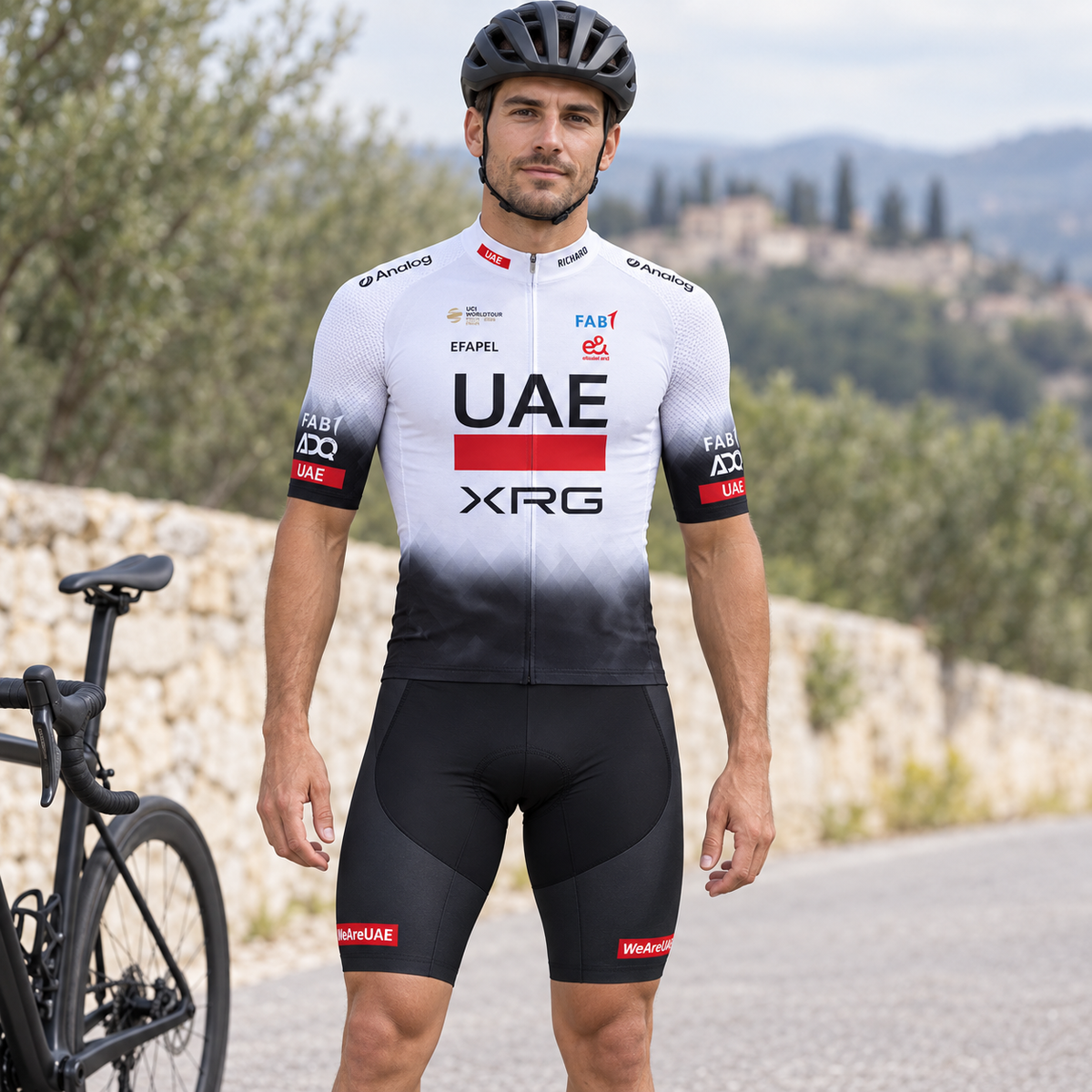 Cyclist wearing UAE Team-Inspired Cycling Jersey & Shorts Set