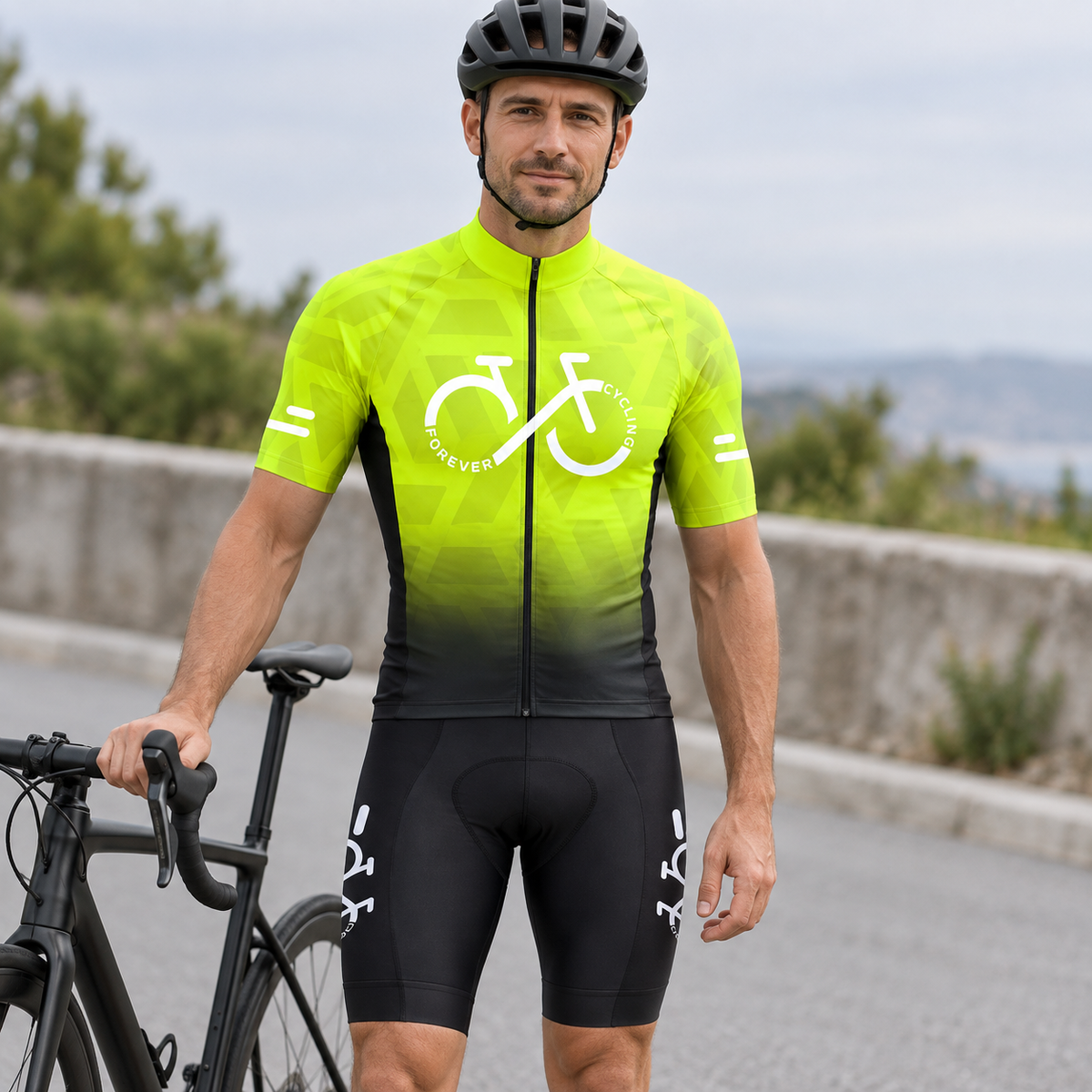 Male cyclist wearing the yellow-to-black gradient cycling jersey and matching black bib shorts